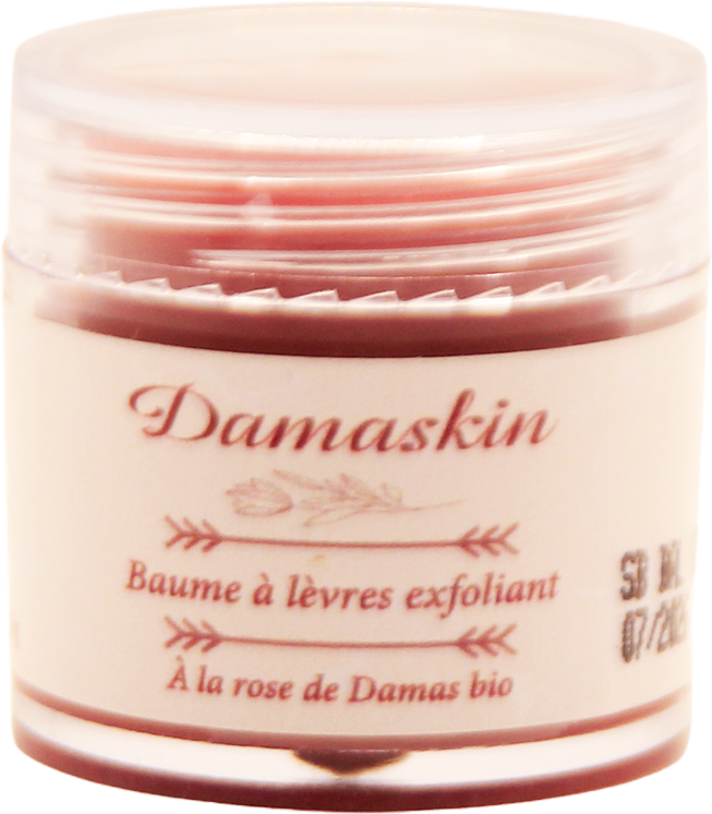 Baume Douceur Rosée — photographie du produit réel, dans un décor de pierre, d’eau et de pétales