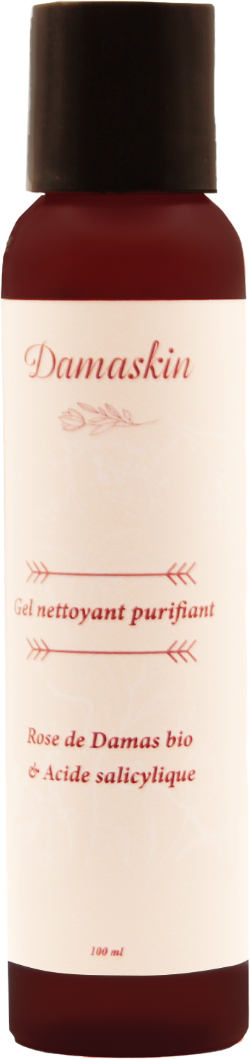 Gel nettoyant purifiant — photographie du produit réel, dans un décor de pierre, d’eau et de pétales
