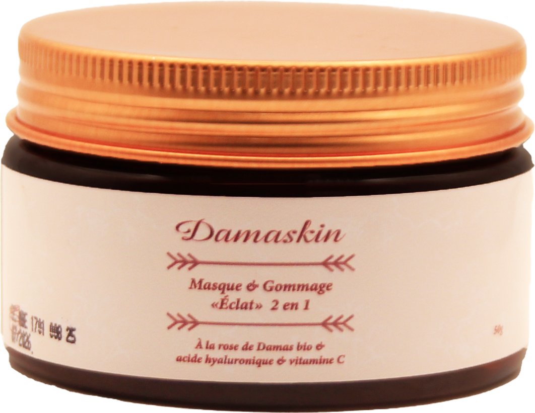 Masque & Gommage Éclat 2 en 1 — photographie du produit réel, dans un décor de pierre, d’eau et de pétales